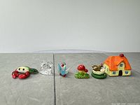 All six miniatures lined up for scale and completeness