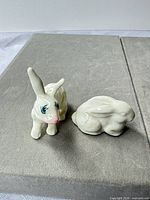 Two porcelain rabbit figurines front view