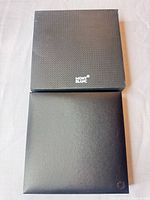 Outer textured box and inner matte case closed