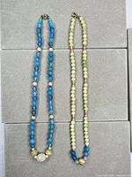 Both necklaces full length on display