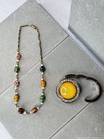 Necklace and purse hook full view