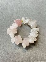 Front view of rose quartz chip bead stretch ring