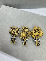 All three floral bouquet button covers front view