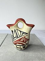 Front view of signed M.M. Toya Jemez Pueblo wedding vase showing geometric decoration