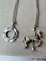 Both necklaces showing pendants side by side