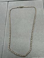 Full view of entire necklace laid flat