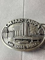 Front view showing entire buckle design and text