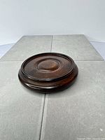 Top view of circular mahogany plinth