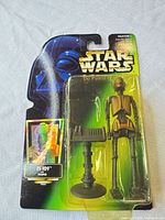 Front view of sealed EV-9D9 figure on Power of the Force card
