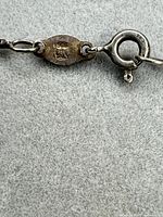 Clasp and tag marked 925 Italy