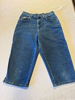 Full view of blue cropped capri jeans front side
