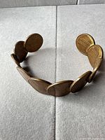 Oblique view showing exterior of copper penny cuff bracelet