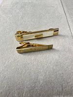 Top view showing both tie clips and design details