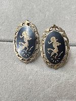Front view of both sterling silver screw-back earrings