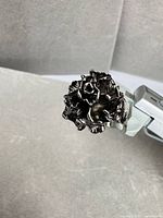 Top view of sculpted floral ring
