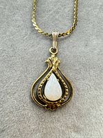 Front view of pendant and portion of chain