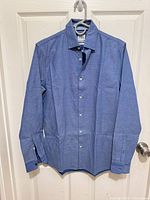 Front view of full shirt on hanger