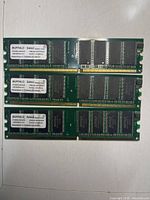 Front view of three Buffalo Select DDR PC3200 memory modules showing specification labels