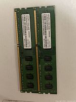 Front view of both DDR3 modules showing PCB and pins