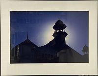 Front view of framed photograph showing subject, mat, and frame