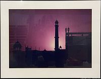 Full view of framed architectural silhouette print with white mat and black frame