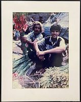 Front view of framed photograph showing subject, mat and frame
