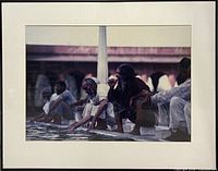 Front view of framed photograph showing image content, mat, and frame