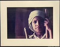 Front view of framed portrait photograph with black frame and white mat
