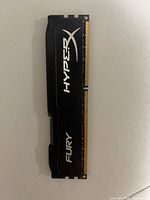 Front view of HyperX Fury DDR3 module showing branding and pins