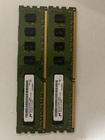 Front view of both Micron DIMMs showing labels and contacts