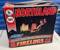 Front of Northland 8-pack firelog carton