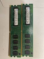 Front view of both Samsung DDR2 modules showing labels and chips