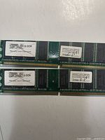 Four views showing both Samsung DDR PC3200 UDIMM modules front side