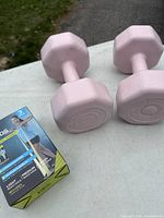 Pair of pink hex dumbbells and boxed flat bands set