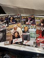 Group shot of six DownBeat magazines arranged on a table