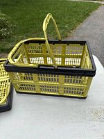Basket opened fully with handle raised on tabletop