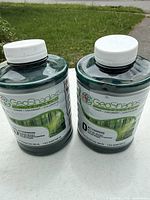 Front view of two GeoShades 1-quart toner colorant bottles