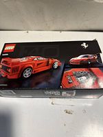 Front of LEGO Speed Champions Ferrari F40 Competizione box showing model image and set branding