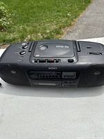 Front and top view showing entire CFD-10 unit, speakers, controls and overall wear