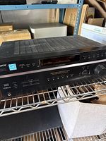 Front view of Sony STR-DE597 receiver on shelf