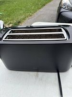 Front and slot view of matte black Zwilling two-slice toaster
