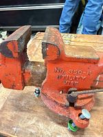 Side view of vise showing model casting and swivel base