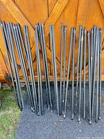All balusters leaned against wooden backdrop
