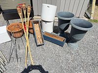 Overall lot with planters, stands, torches