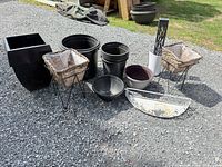 Group shot of all planters and accessories on gravel surface