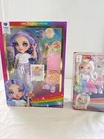 Both boxed Rainbow High dolls front view