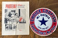 Both advertising pieces laid out on wood surface