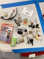 Group shot of all padlocks, combination locks, packaged items and keys