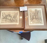 Both framed prints side by side