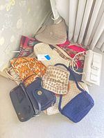 Group view of all bags piled on floor